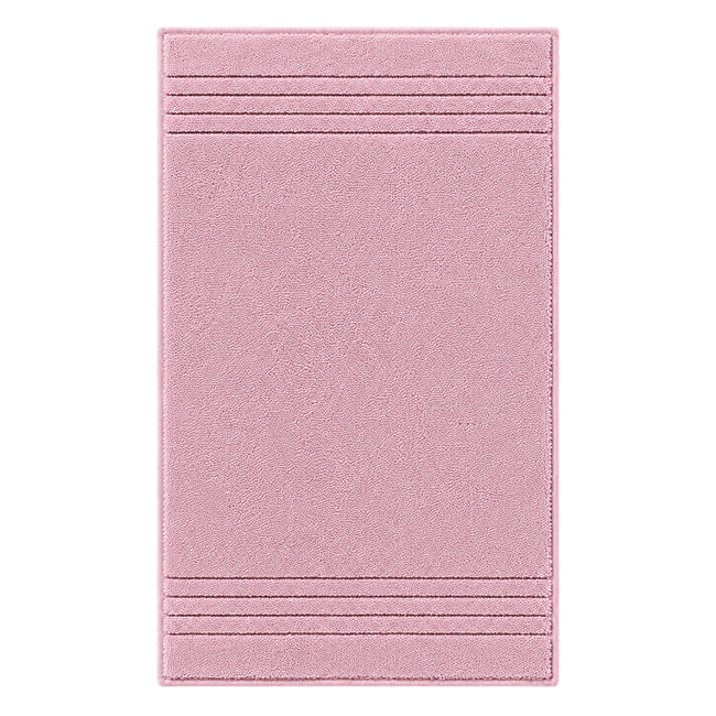 Lilac bath mat with textured stripe details.