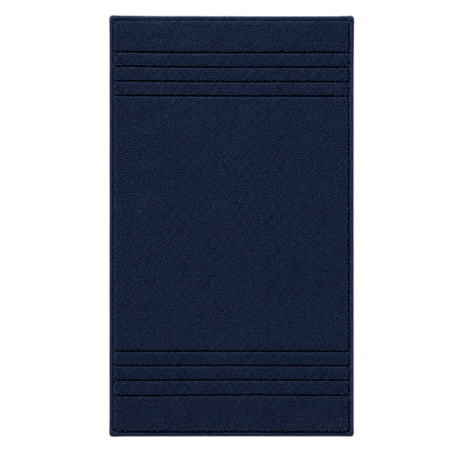 Navy blue bath mat with textured stripe details.
