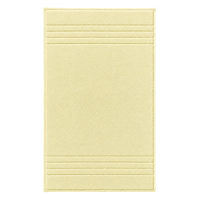 Yellow bath mat with textured stripe details.