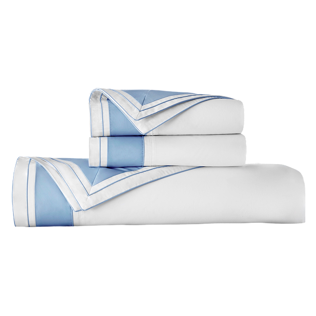 White and blue border duvet cover set with matching pillow shams folded.
