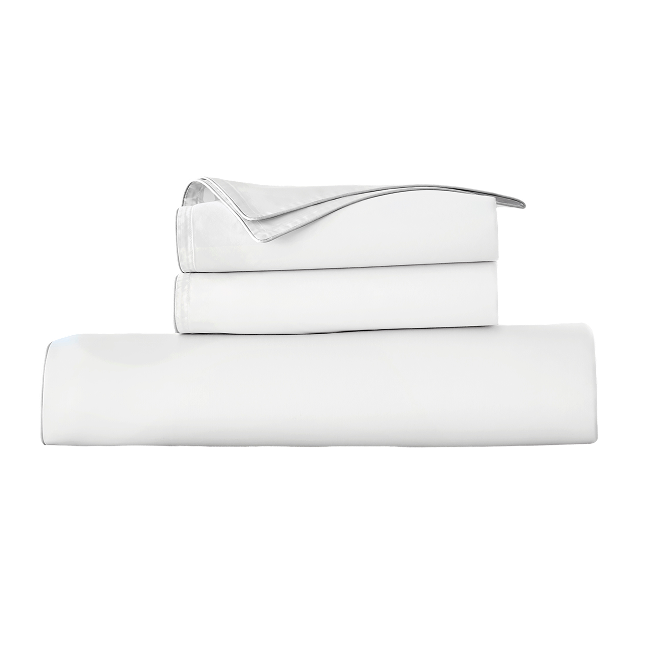 Set of white bedding including a duvet and two pillows on a white background