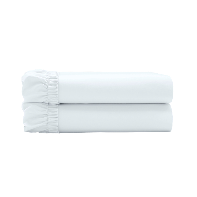 Two white fitted sheets folded and stacked.