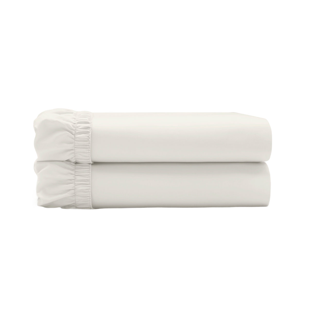 Two ivory fitted sheets folded and stacked.