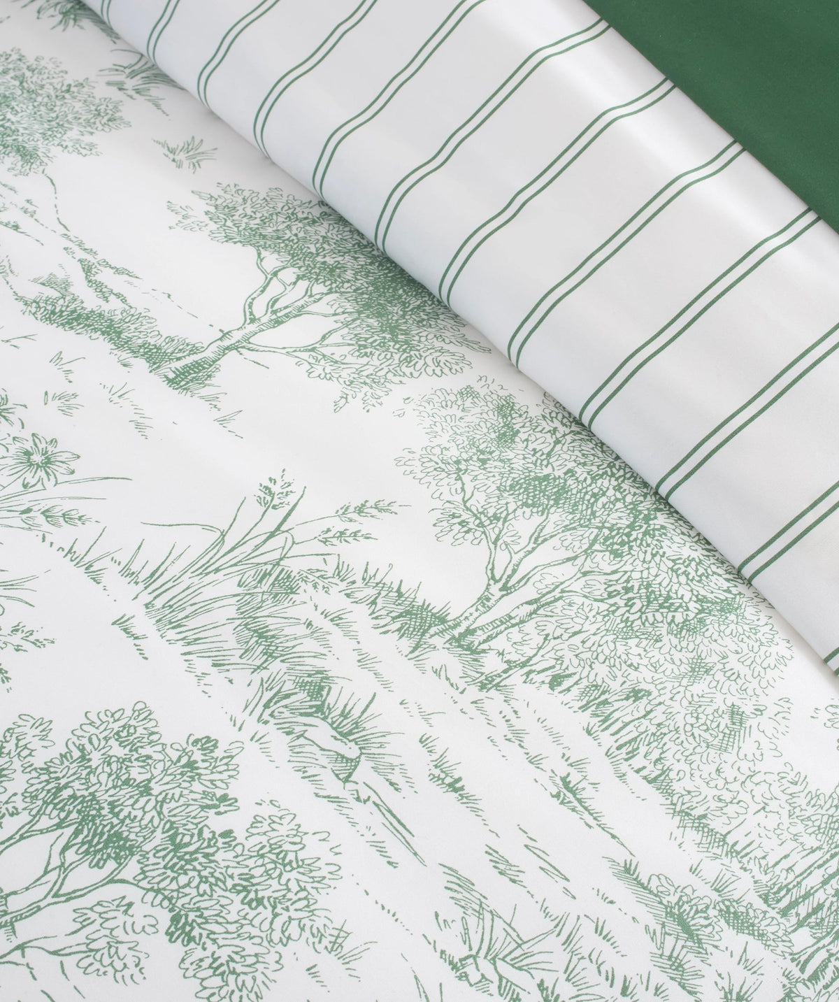 Close-up of the garden toile print and striped reverse.