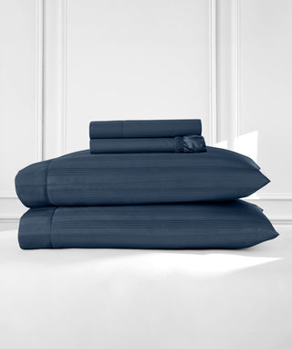 Supreme Egyptian Cotton Striped Sheet Set folded and stacked with its pillowcases