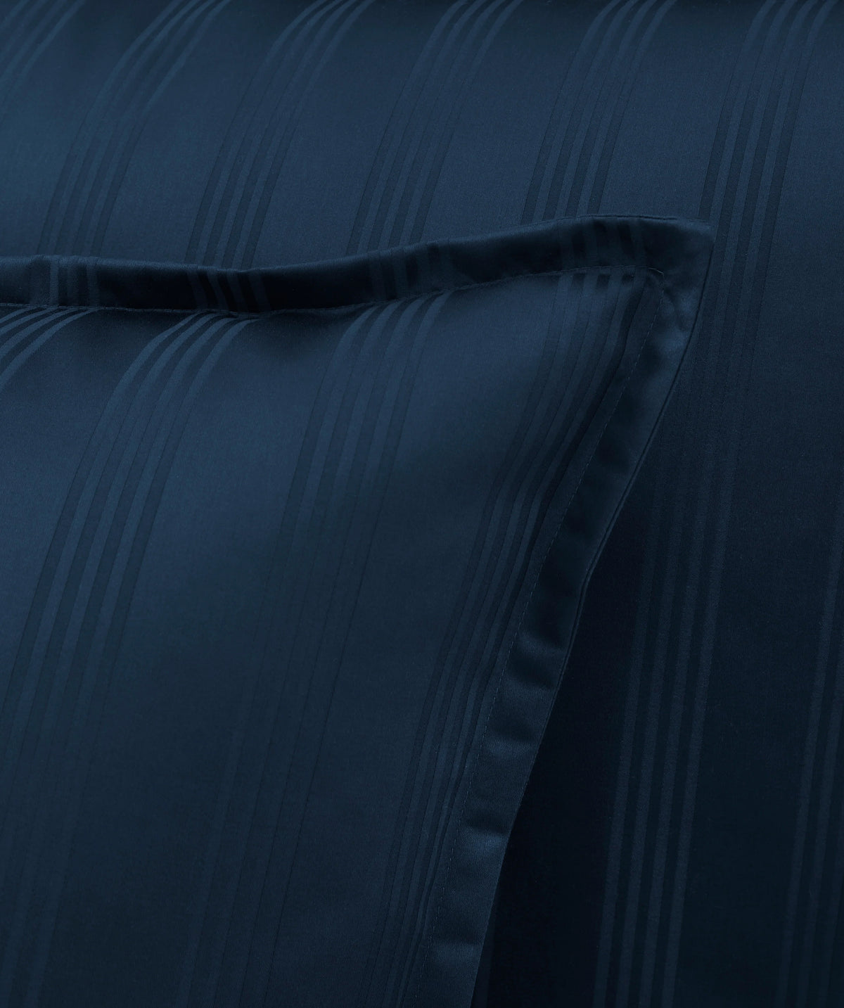 Navy blue sateen pillowcase with a soft texture