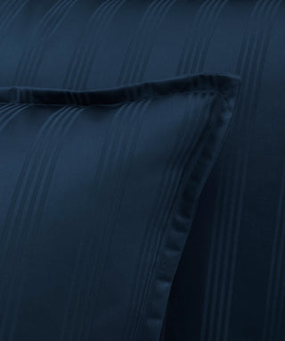 Navy blue sateen pillowcase with a soft texture