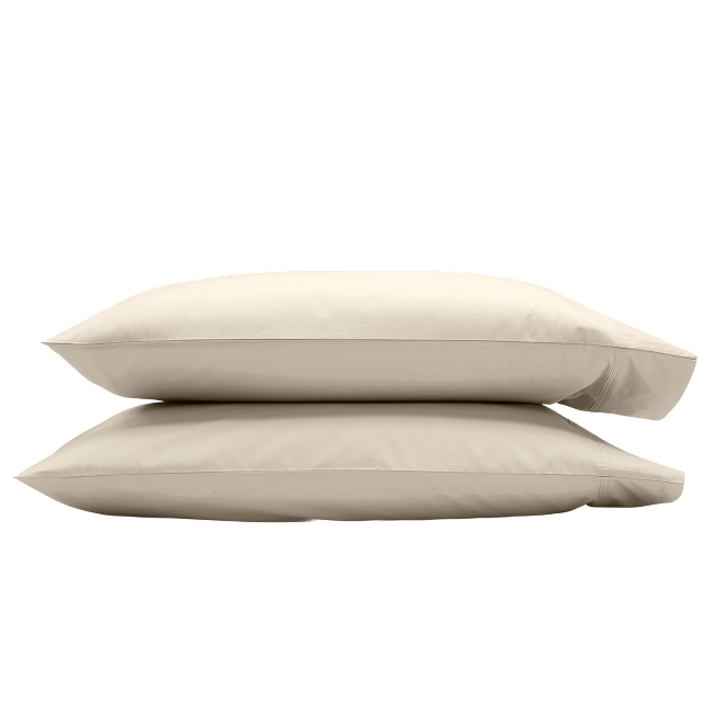 Two beige pillowcases stacked on top of each other.