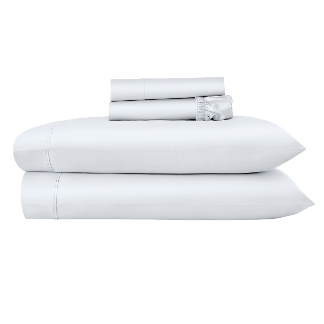 Folded white sheet set stacked with coordinating pillowcases.  
