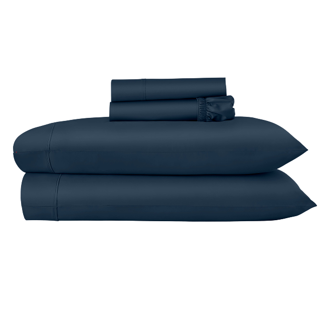 Folded navy sheet set stacked with coordinating pillowcases.  