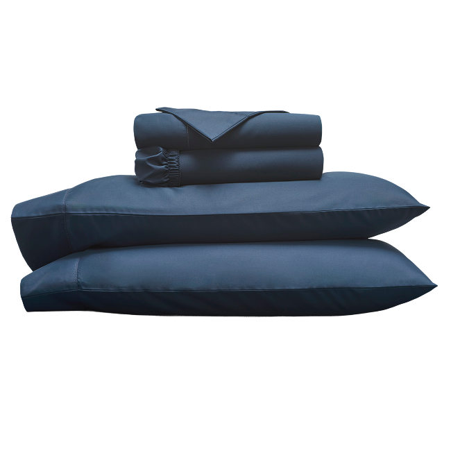 Folded navy blue sheet set with and pillowcases stacked together.  