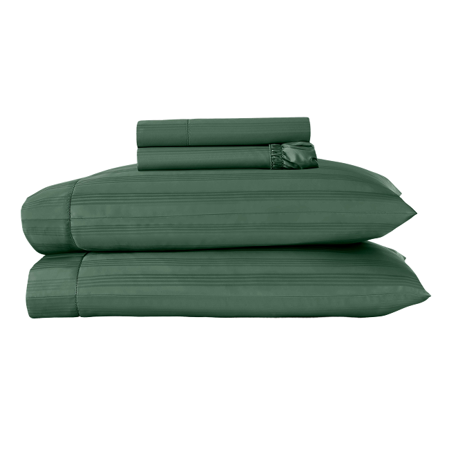 Myrtle green sheet set folded with matching pillowcases.