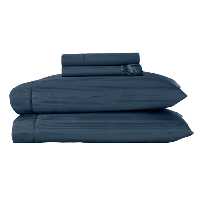 Moonlit Ocean sheet set folded with matching pillowcases.
