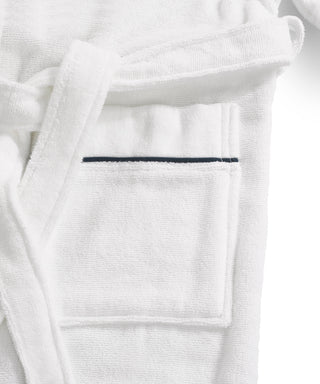 Close-up of the robe pocket with navy trim.