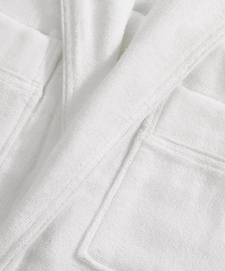 Close-up of the white robe collar and pocket.